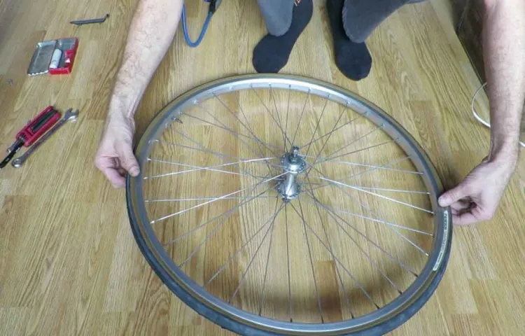 how to fix wobbly tire on bike