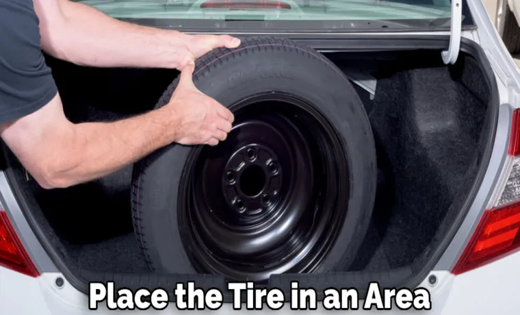 how to get spare tire out of trunk