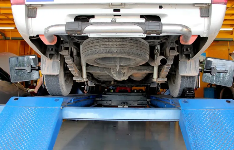 how to remove a spare tire from under the car